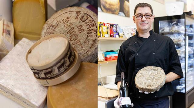 Ejeren af Gastronomer på Frederiksberg fremviser god ost og vin.